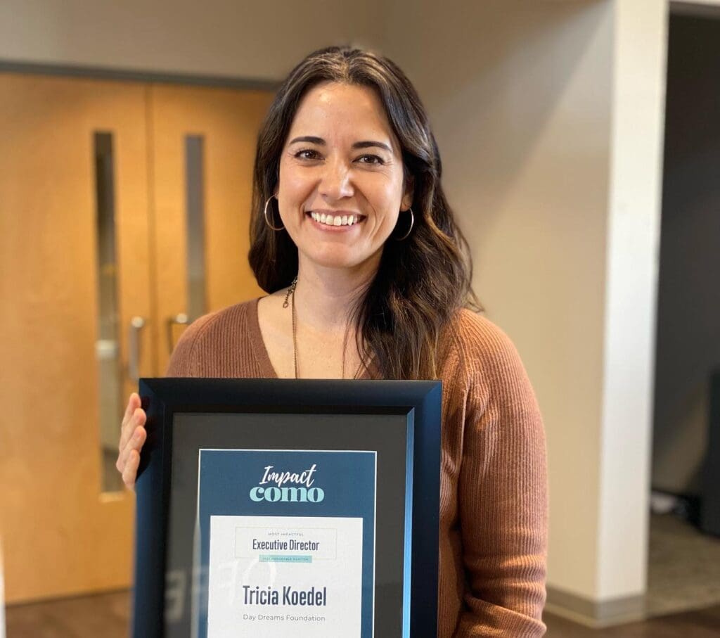 Koedel Recevies Honor from Impact COMO